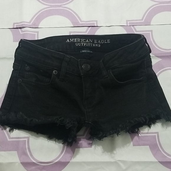 American Eagle Outfitters Pants - 3/$25American Eagle Black Fray SUPER LOW SHORTIE 0